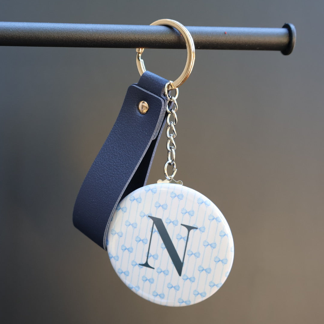 Keychain with letter 'N' on a blurred background